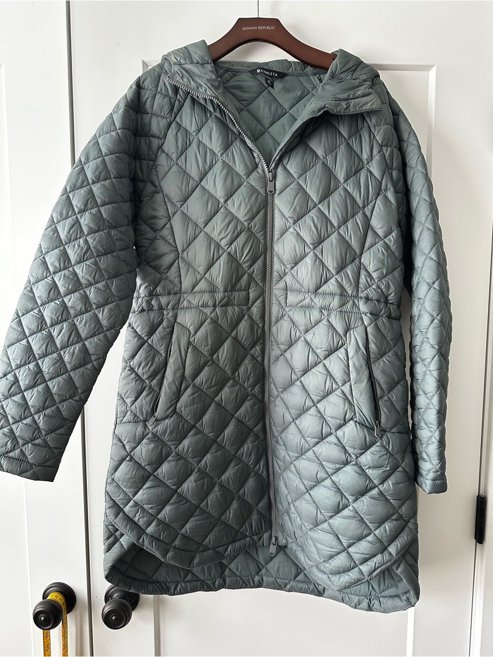 Athleta Whisper Featherless Puffer Parka, size Medium Tall in slate blue.